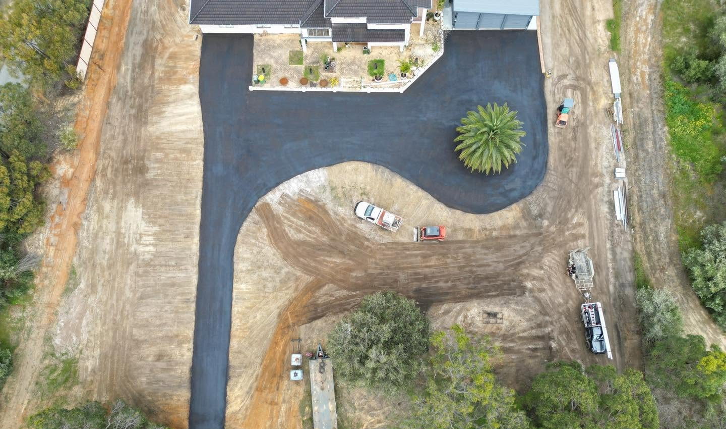 Aerial view of a finished driveway and earthworks on a Perth Hills property