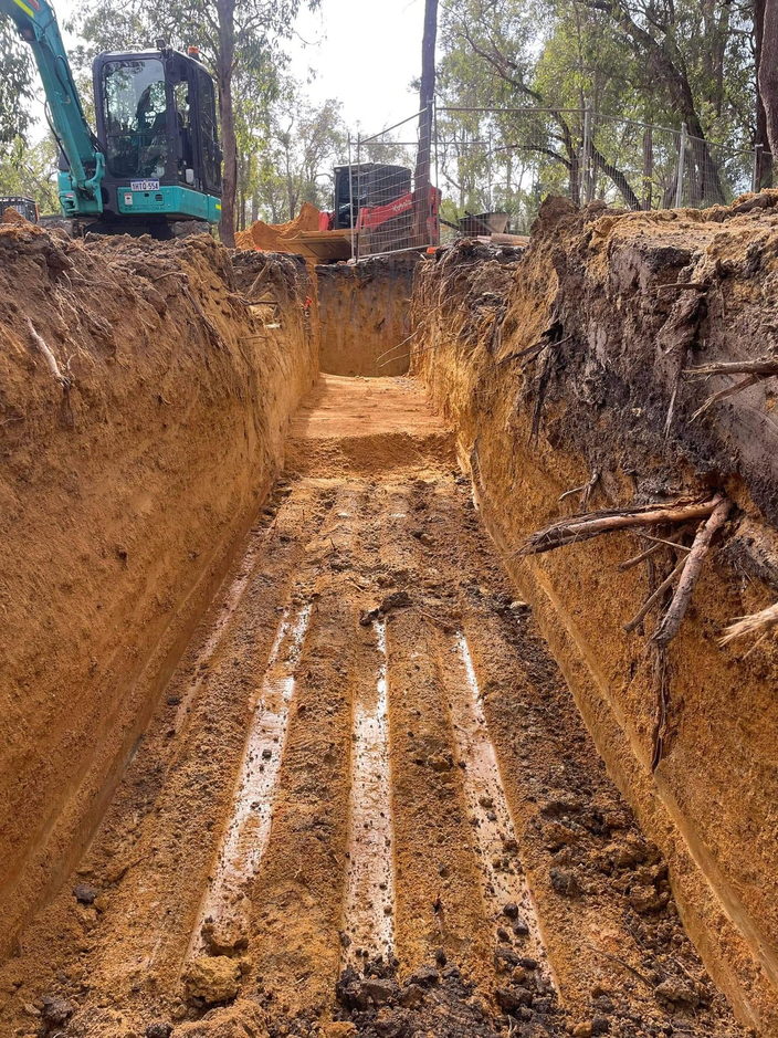 Service trench excavated by Gidge Civil, ready for pipe and backfill